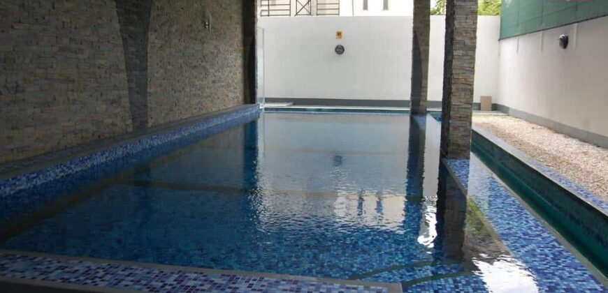 appartement trois chambres situé dans une résidence sécurisée avec piscine et ascenseur au calme à Flic en Flac.