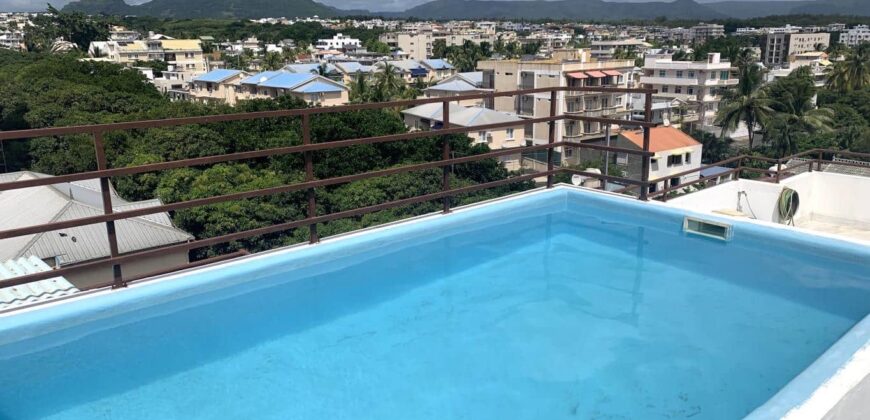 Location d’un charmant appartement avec piscine dans une résidence sécurisée à quelques pas de la plage et des commerces à Flic en Flac