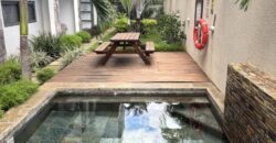 A vente un appartement de standing de 86m2 avec piscine et terrasse couverte proche plage à Flic en Flac
