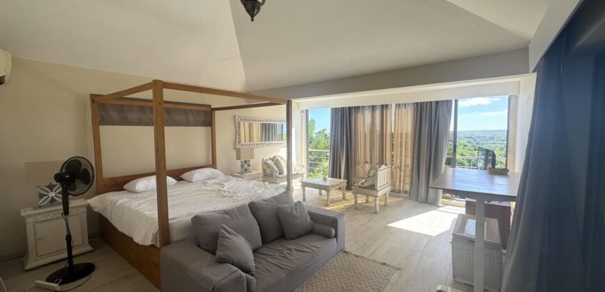 Location d’une somptueuse villa contemporaine offrant une vue imprenable sur la mer et les montagnes à Tamarin