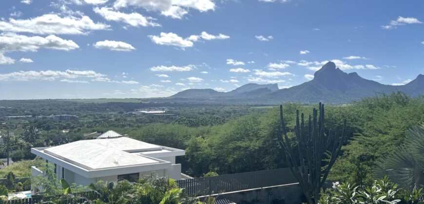 Location d’une somptueuse villa contemporaine offrant une vue imprenable sur la mer et les montagnes à Tamarin