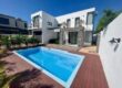 En vente une magnifique villa neuve de 220m2 avec piscine et grand jardin luxuriant dans le secteur prisée de Trou aux Biches