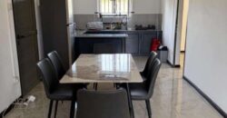 A louer un lumineux appartement avec piscine commune et terrasse à Pereybère