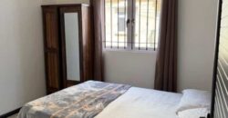 A louer un lumineux appartement avec piscine commune et terrasse à Pereybère