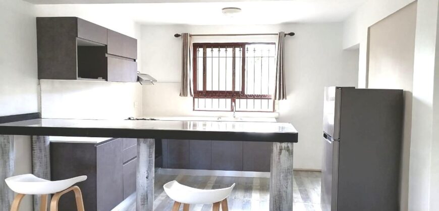A vendre un charmant appartement situé proche plage et commerces dans un cadre verdoyant à Flic en Flac