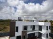 En vente une villa neuve avec piscine et rooftop offrant vue panoramique sur le coin de mire à Grandbaie