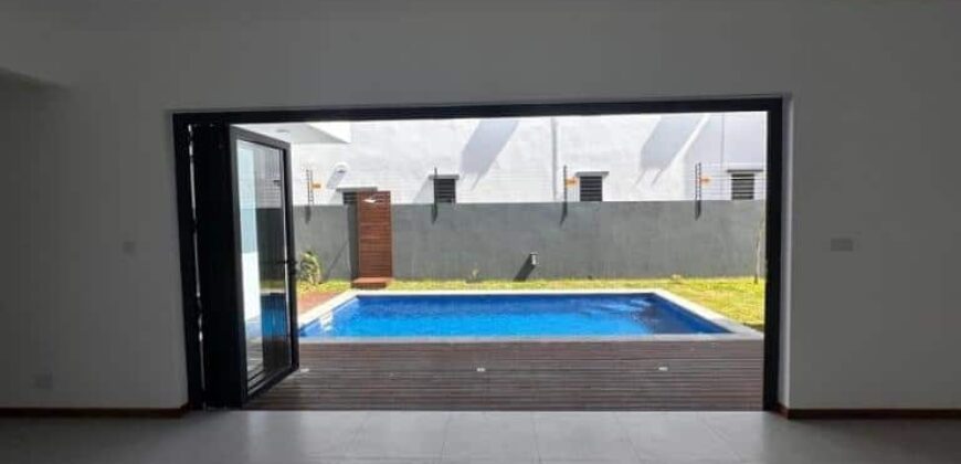 En vente une villa neuve avec piscine et rooftop offrant vue panoramique sur le coin de mire à Grandbaie