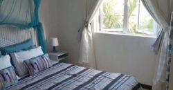 Accessible aux étrangers: En vente un lumineux appartement avec piscine en plein coeur de Grandbaie
