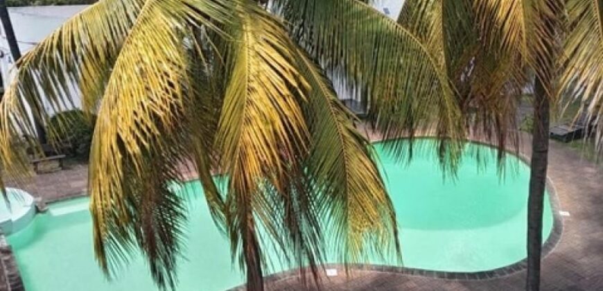 À louer un lumineux appartement dans une résidence avec piscine commune proche plage à Trou aux Biches