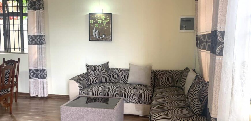 À louer un charmant appartement avec jardin dans un quartier paisible à Flic en Flac.