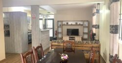 À louer un charmant appartement avec jardin dans un quartier paisible à Flic en Flac.