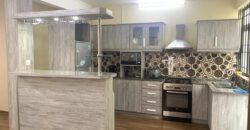 À louer un charmant appartement avec jardin dans un quartier paisible à Flic en Flac.