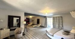 En vente une spacieuse villa moderne de 300 m² située dans un quartier résidentiel paisible à Flic en Flac