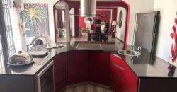 En vente une spacieuse villa moderne de 300 m² située dans un quartier résidentiel paisible à Flic en Flac