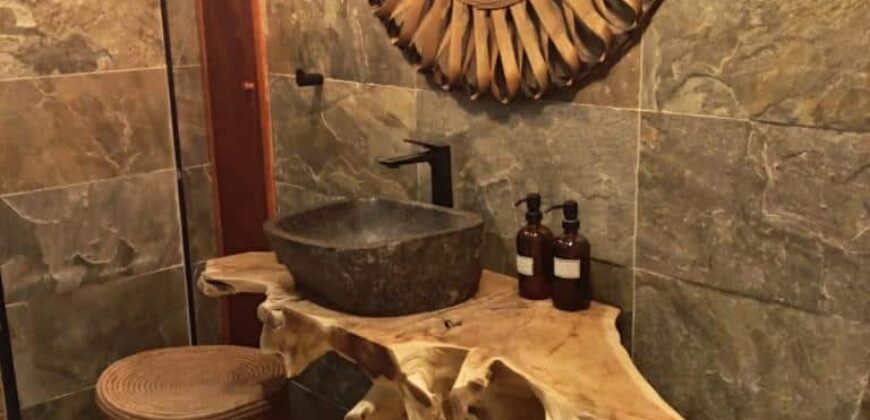 Location d’un appartement haut de gamme et entièrement rénové proche de la plage à Pointe aux Canonniers