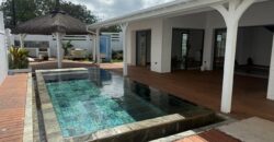 Accessible aux étrangers: À vendre une élégante villa tropicale de 230m2 dans une résidence sécurisée avec piscine à Pereybère