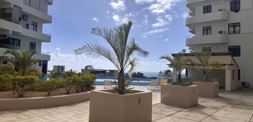 À louer un charmant appartement dans une résidence de standing avec piscine et salle de sport à Flic en Flac