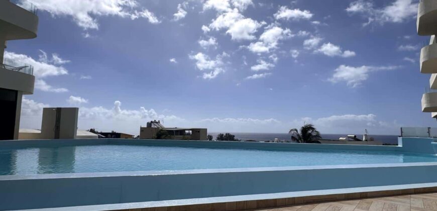 À louer un charmant appartement dans une résidence de standing avec piscine et salle de sport à Flic en Flac