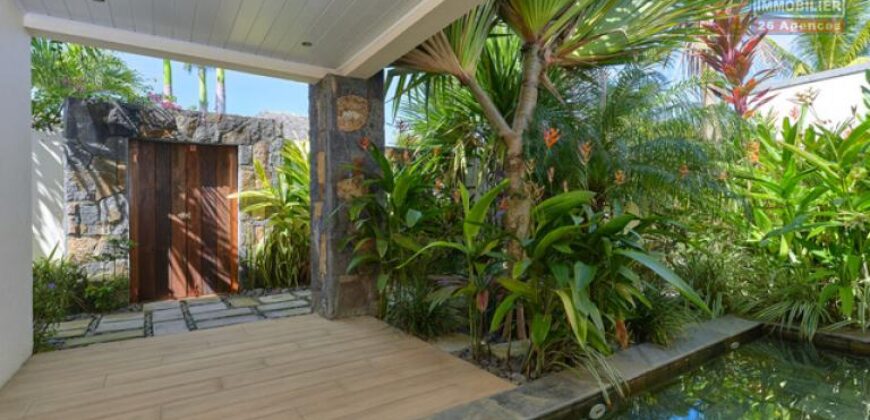 Accessible aux étrangers: En vente un ravissant appartement proche de la plage à Pointe aux Canonniers