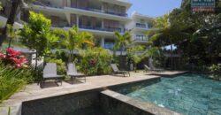 Accessible aux étrangers: En vente un ravissant appartement proche de la plage à Pointe aux Canonniers