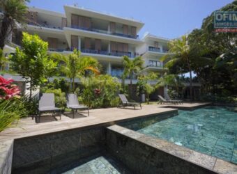 Accessible aux étrangers: En vente un ravissant appartement proche de la plage à Pointe aux Canonniers