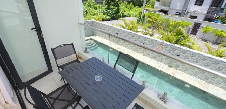 Location d’un charmant appartement rénové dans une résidence sécurisée avec piscine commune à Pereybère