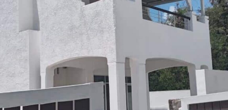 Location d’une grande villa proche de la plage et commerces à Pereybère