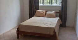 Location d’une grande villa proche de la plage et commerces à Pereybère