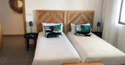 À vendre appartement haut de gamme proche du lagon au cœur du domaine Mythic Suites & Villas à Grand Gaube