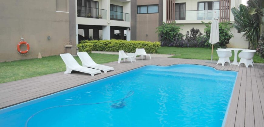 À vendre un lumineux appartement meublé en résidence de standing avec piscine à Flic en Flac Maurice